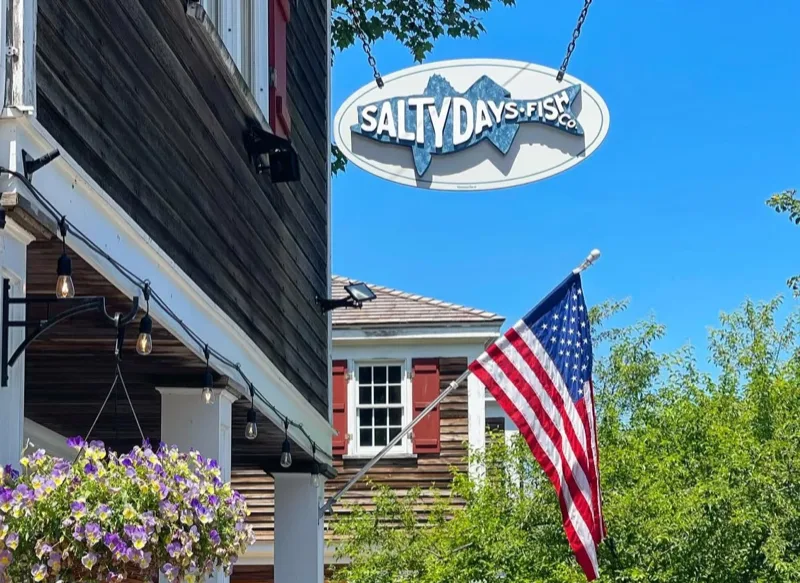 Salty Days Fish Co. storefront sign in Cohasset Village